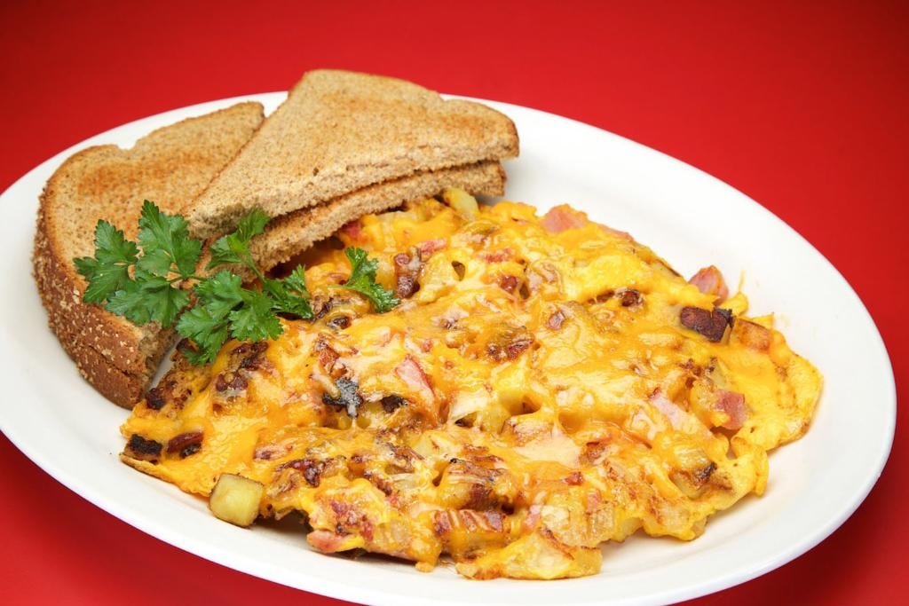 Cheesy omelette with toast — Grimm's Deli