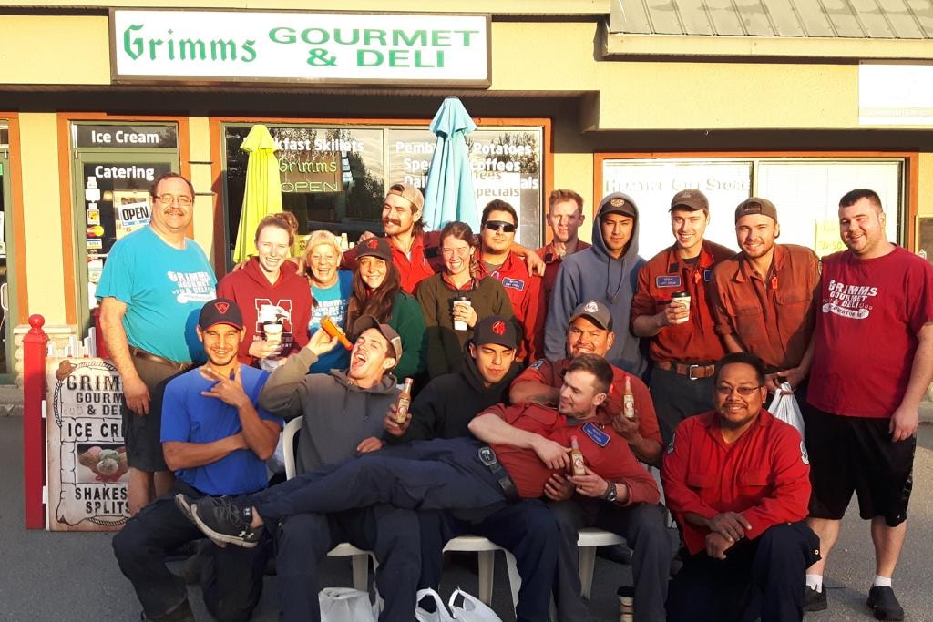 The Grimm's Deli team outside the restaurant