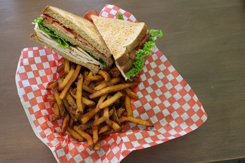 Deli sandwich with fries