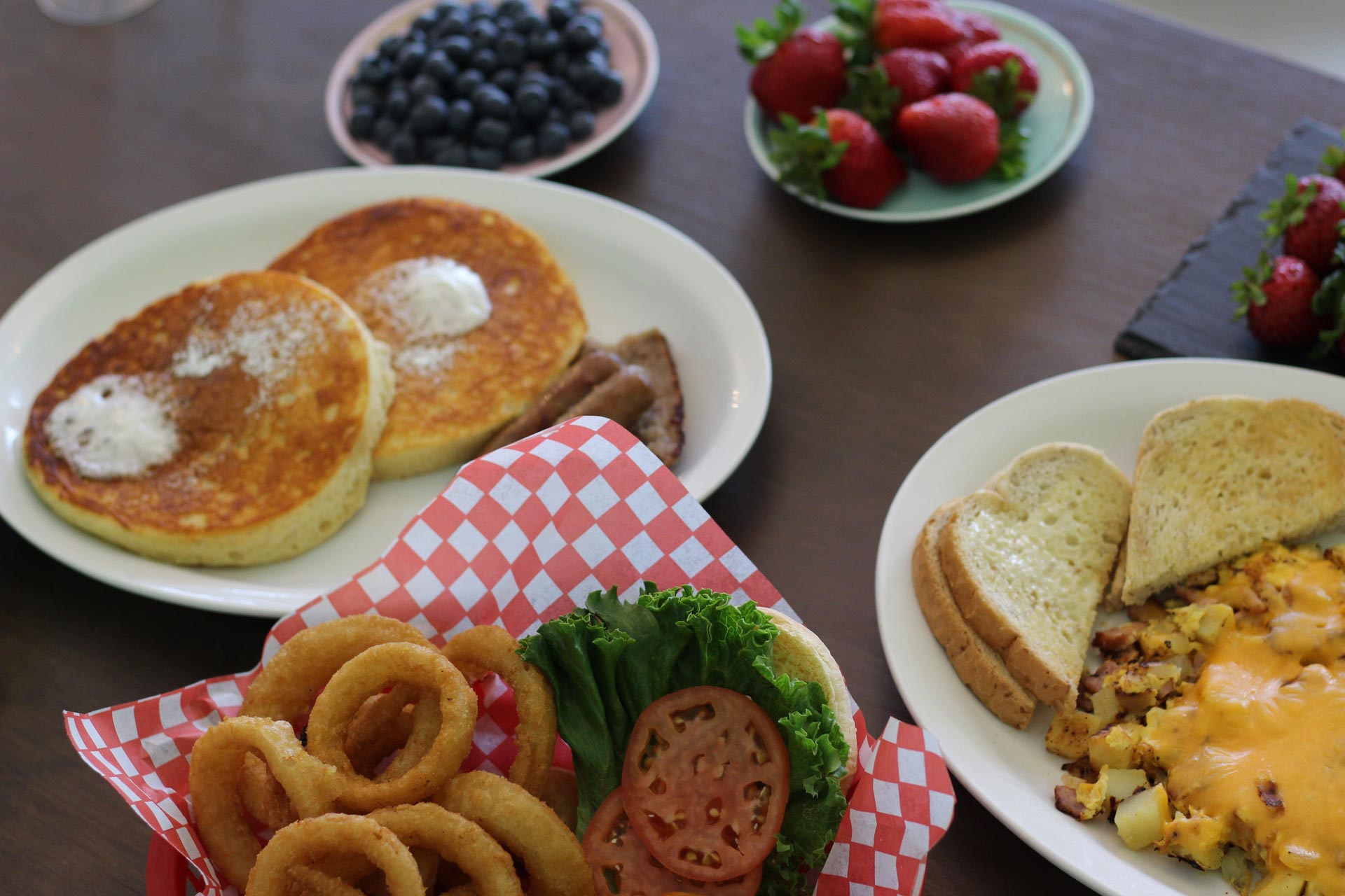 Breakfast food flat lay with pancakes and eggs